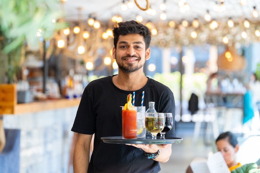 Delivering drinks on a tray